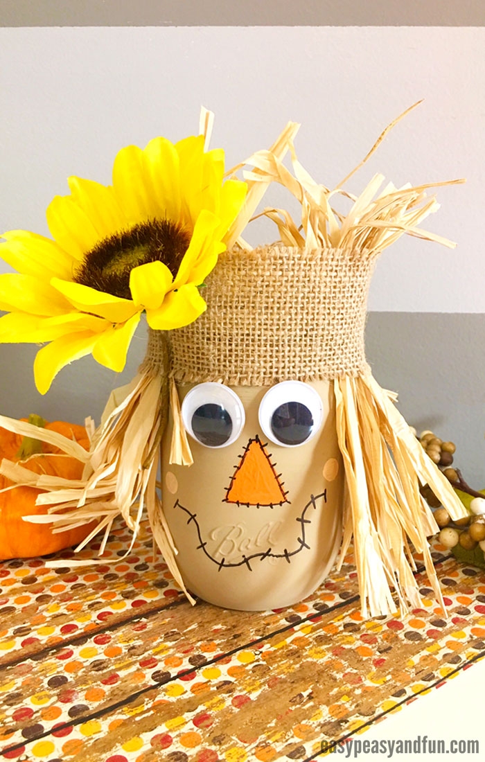 Mason jar decorated as scarecrow