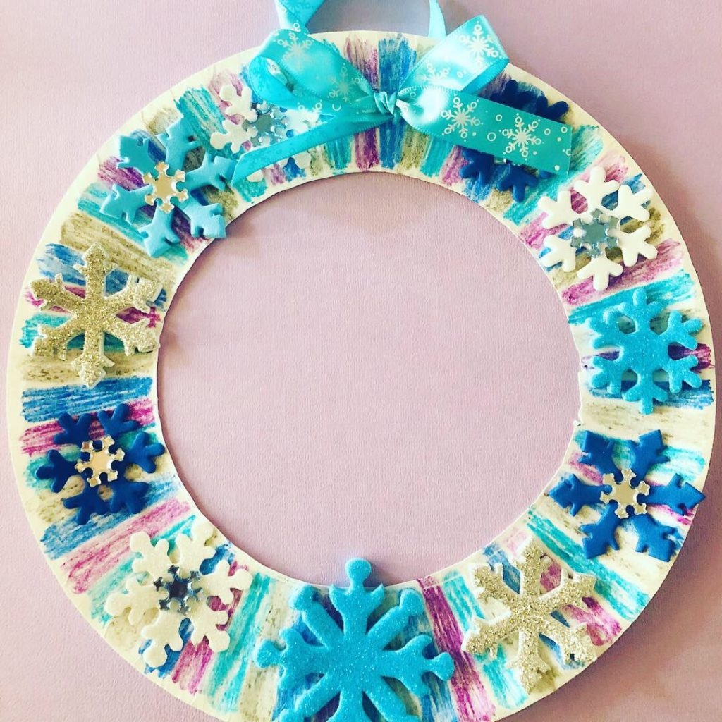 Wreath with glued on snowflakes.